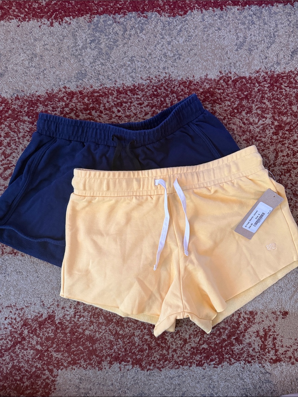 Albion Fit - at ease yellow casual shorts and navy blue sweatshirt shorts